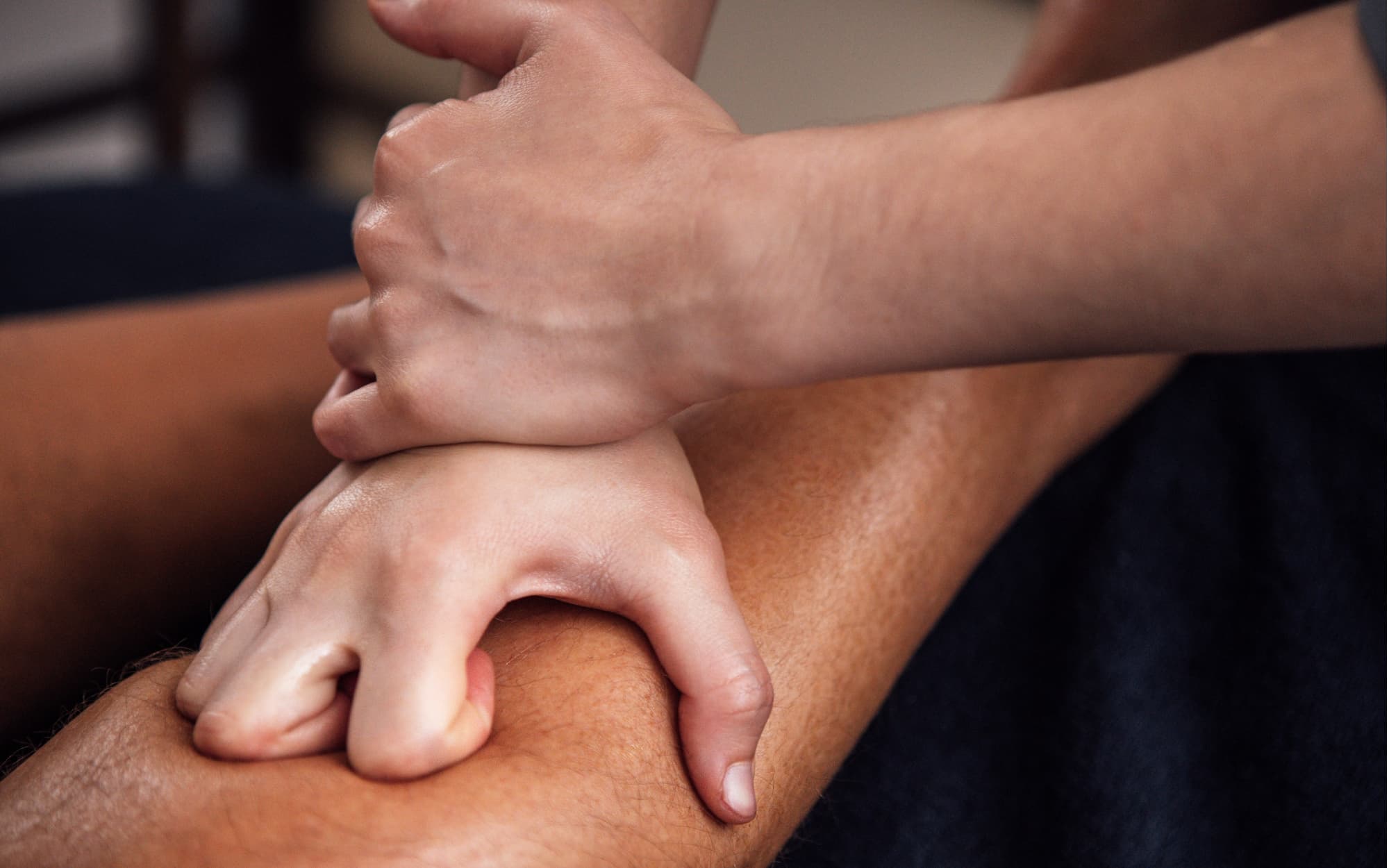 A detail shot of hands working, or the treatment room
